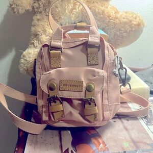 Doughnut crossbody mini bag.